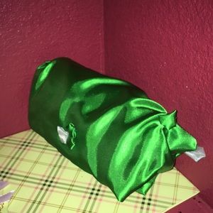 Emerald silk makeup clutch by Doodlez